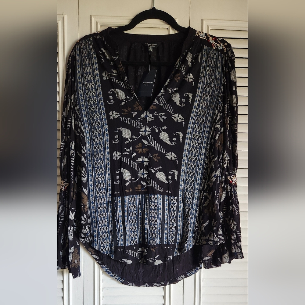 Lucky Brand top size small bell sleeves